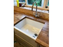 Belfast sink and swan neck tap installed